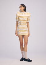 A model wears the Issey Miyake GENERIC WEAR?STRIPES prêt à porter.
