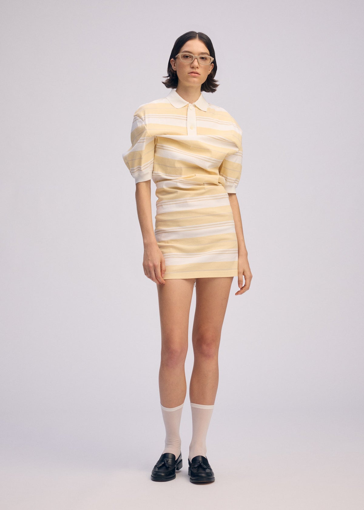 A model wears the Issey Miyake GENERIC WEAR?STRIPES prêt à porter.