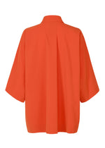 A detail shot of the Issey Miyake LOOPED shirt.