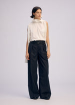 A model wears the ISSEY MIYAKE ODD SHIRT 2 prêt à porter.