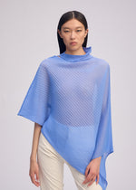 A model wears the ISSEY MIYAKE SHEER SCARF PLEATS prêt à porter.