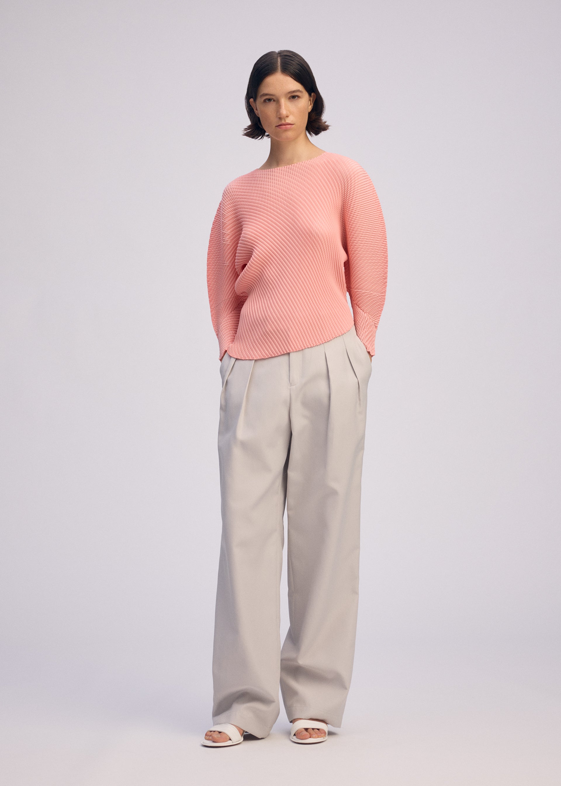 A model wears the ISSEY MIYAKE MISTY PLEATS misty-pleats-shirt-black-6.