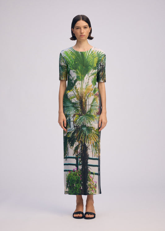 A model wears the Issey Miyake URBAN JUNGLE PLEATS shirt.