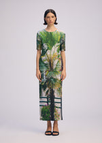 A model wears the Issey Miyake URBAN JUNGLE PLEATS shirt.