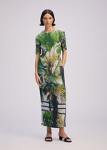 A model wears the Issey Miyake URBAN JUNGLE PLEATS shirt.