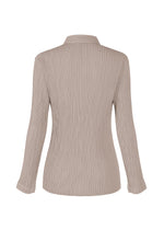 A detail shot of the ISSEY MIYAKE HATCHING PLEATS prêt à porter.