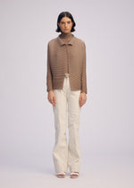 A model wears the ISSEY MIYAKE WOOLY PLEATS 66 prêt à porter.