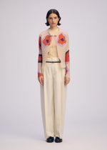 A model wears the Issey Miyake VERVE PLEATS TOP prêt à porter.