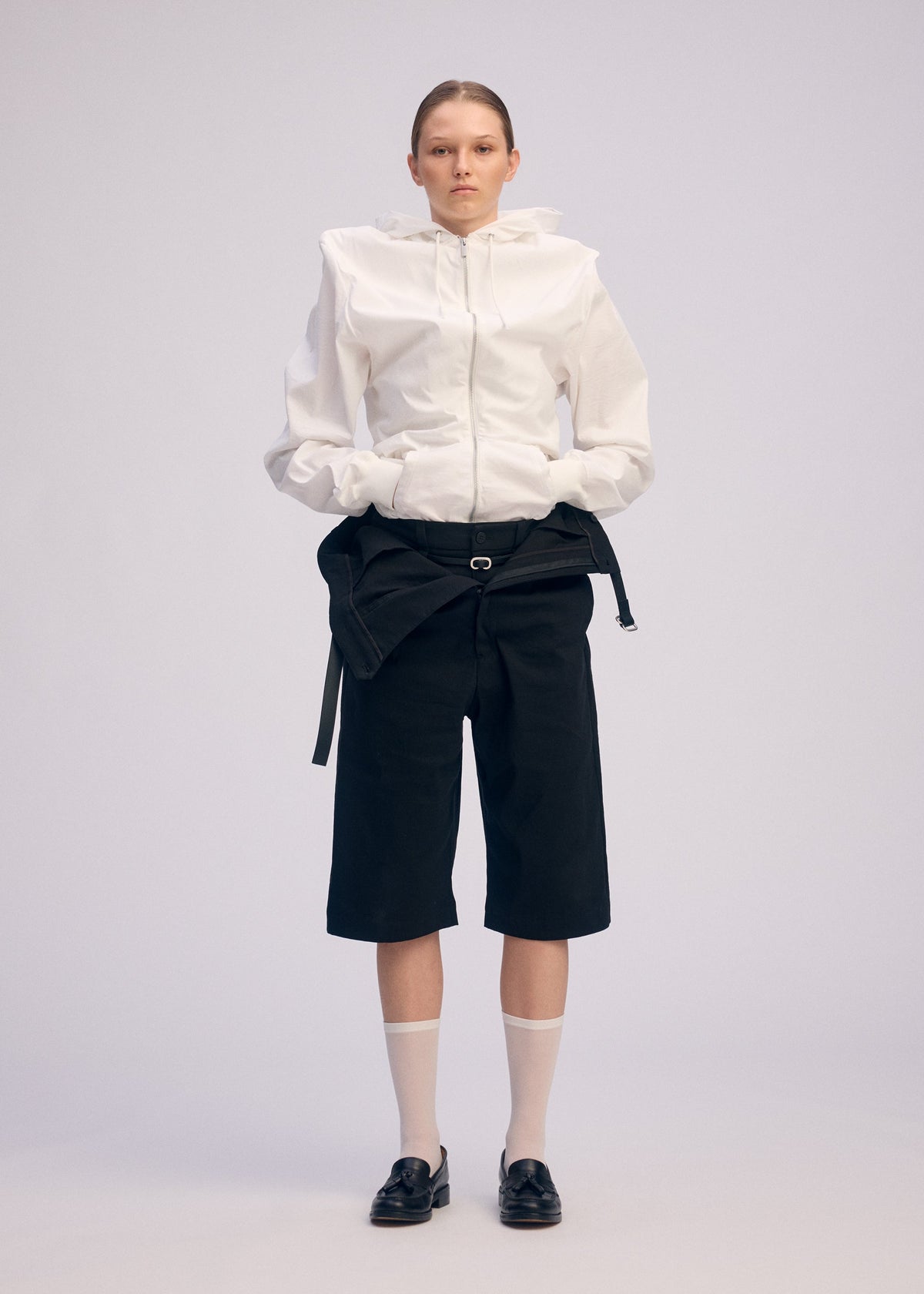 A model wears the Issey Miyake GENERIC WEAR prêt à porter.