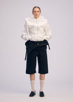 A model wears the Issey Miyake GENERIC WEAR prêt à porter.