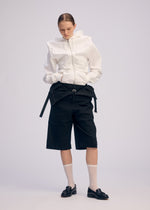 A model wears the Issey Miyake GENERIC WEAR prêt à porter.