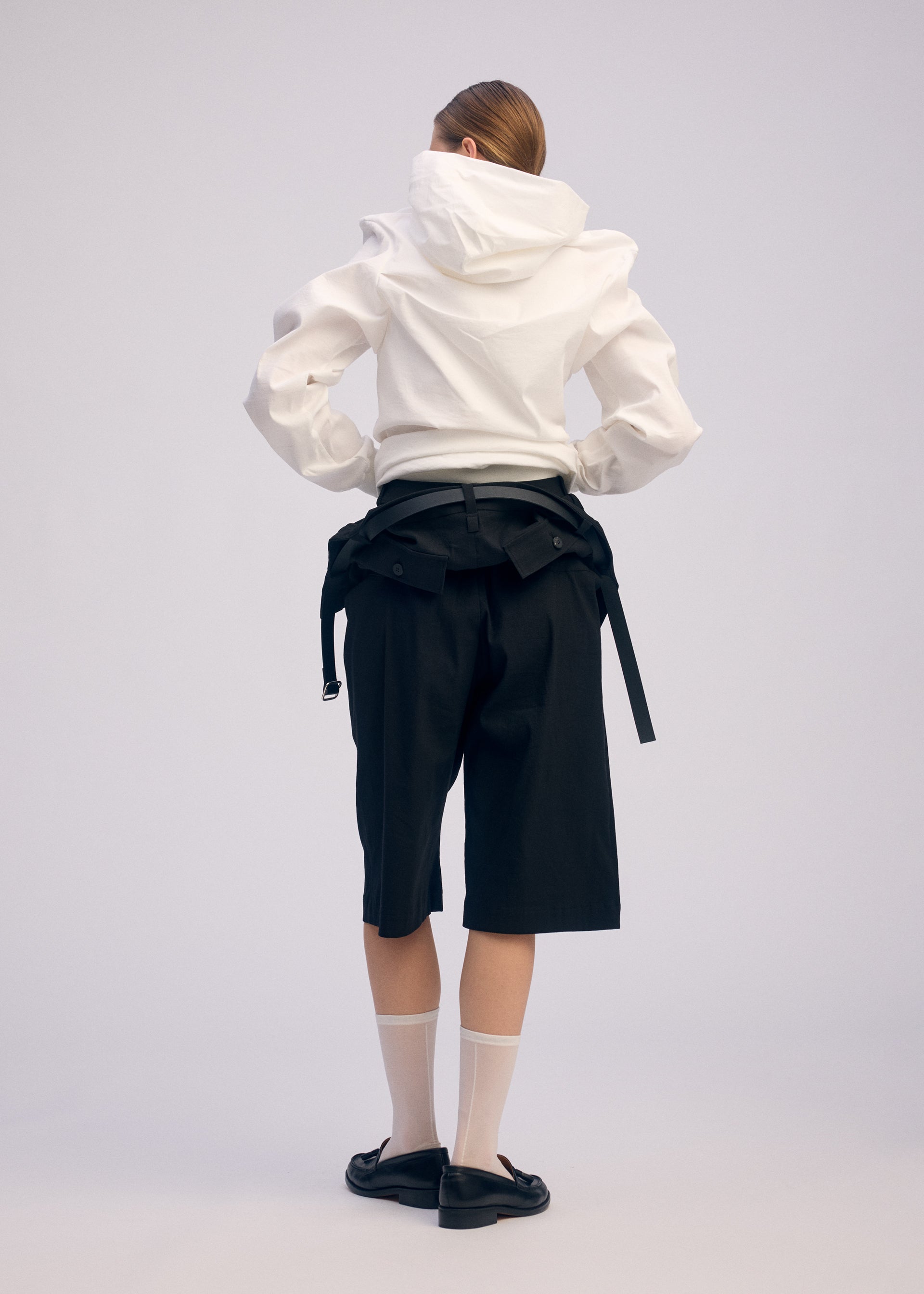 A model wears the Issey Miyake GENERIC WEAR prêt à porter.