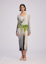 A model wears the Issey Miyake URBAN JUNGLE PLEATS cardigan.
