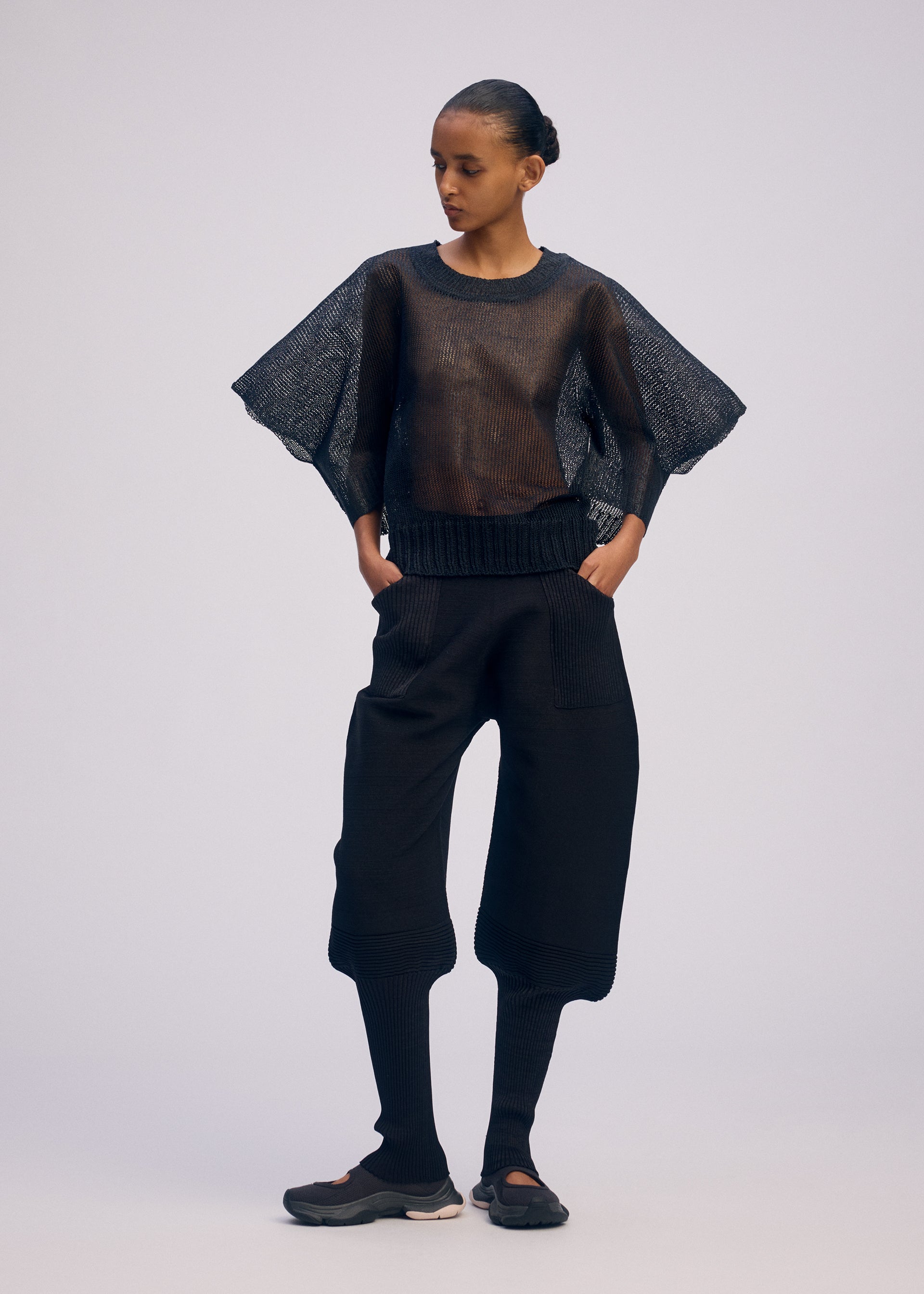 A model wears the Issey Miyake CIALDA prêt à porter.