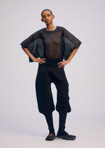 A model wears the Issey Miyake CIALDA prêt à porter.