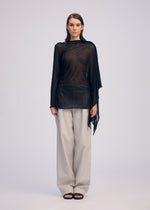 A model wears the ISSEY MIYAKE CONCEALED KNIT concealed-knit-top-starling-blue.