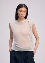 A model wears the ISSEY MIYAKE CONCEALED KNIT concealed-knit-top-light-grey-1.