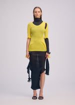 A model wears the ISSEY MIYAKE ADVENTITIOUS?SLEEVES top.
