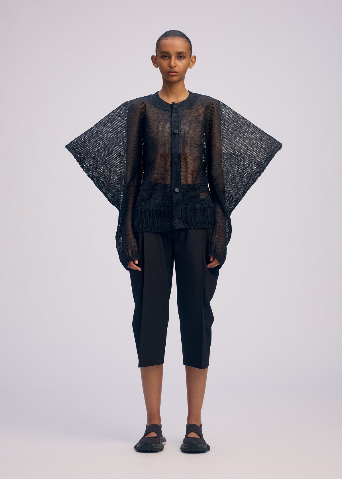 A model wears the Issey Miyake CIALDA prêt à porter.