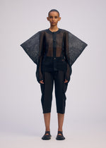 A model wears the Issey Miyake CIALDA prêt à porter.