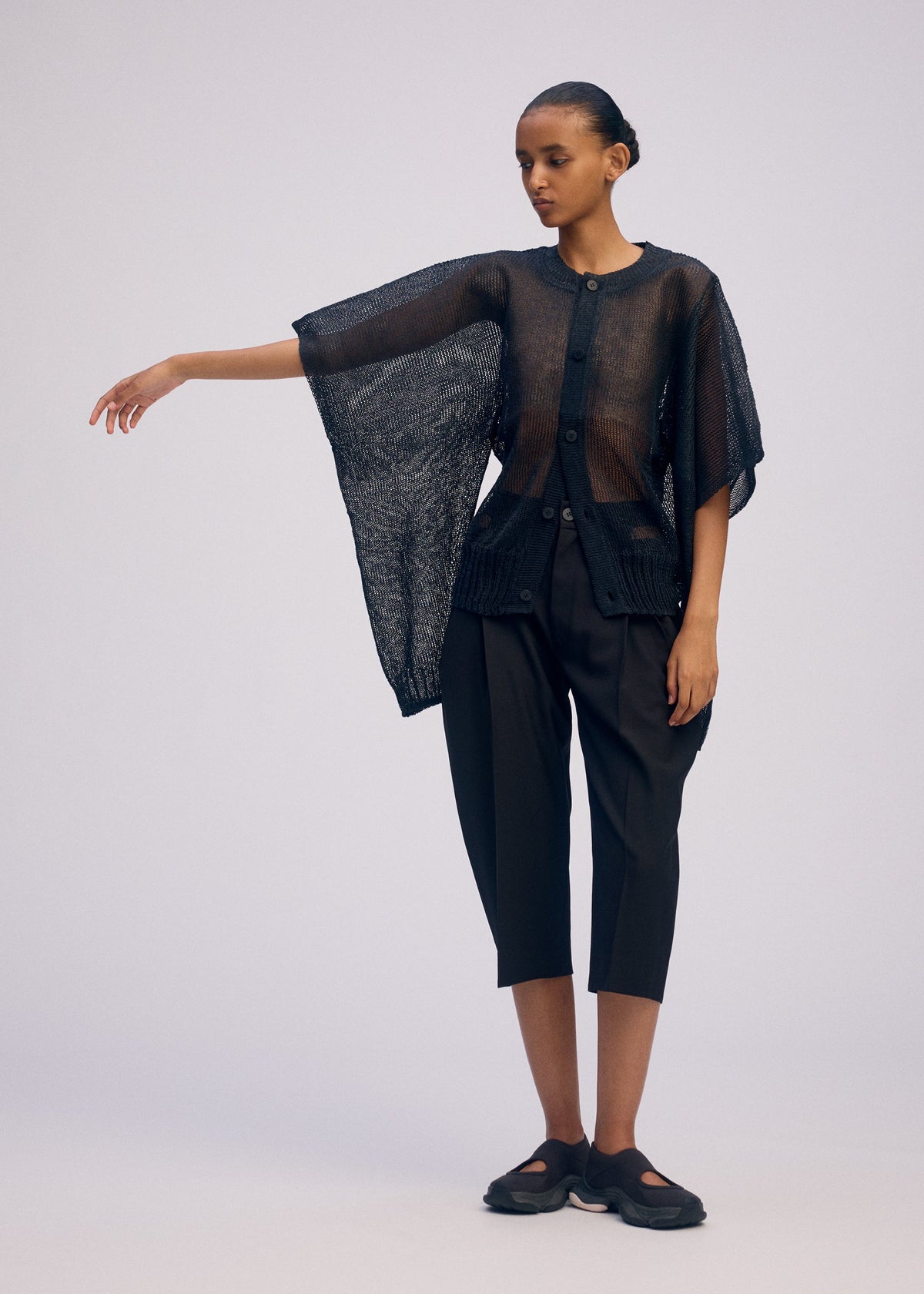 A model wears the Issey Miyake CIALDA prêt à porter.