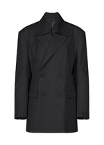 A product shot of the ISSEY MIYAKE HONEST ENSEMBLE jacket in black.