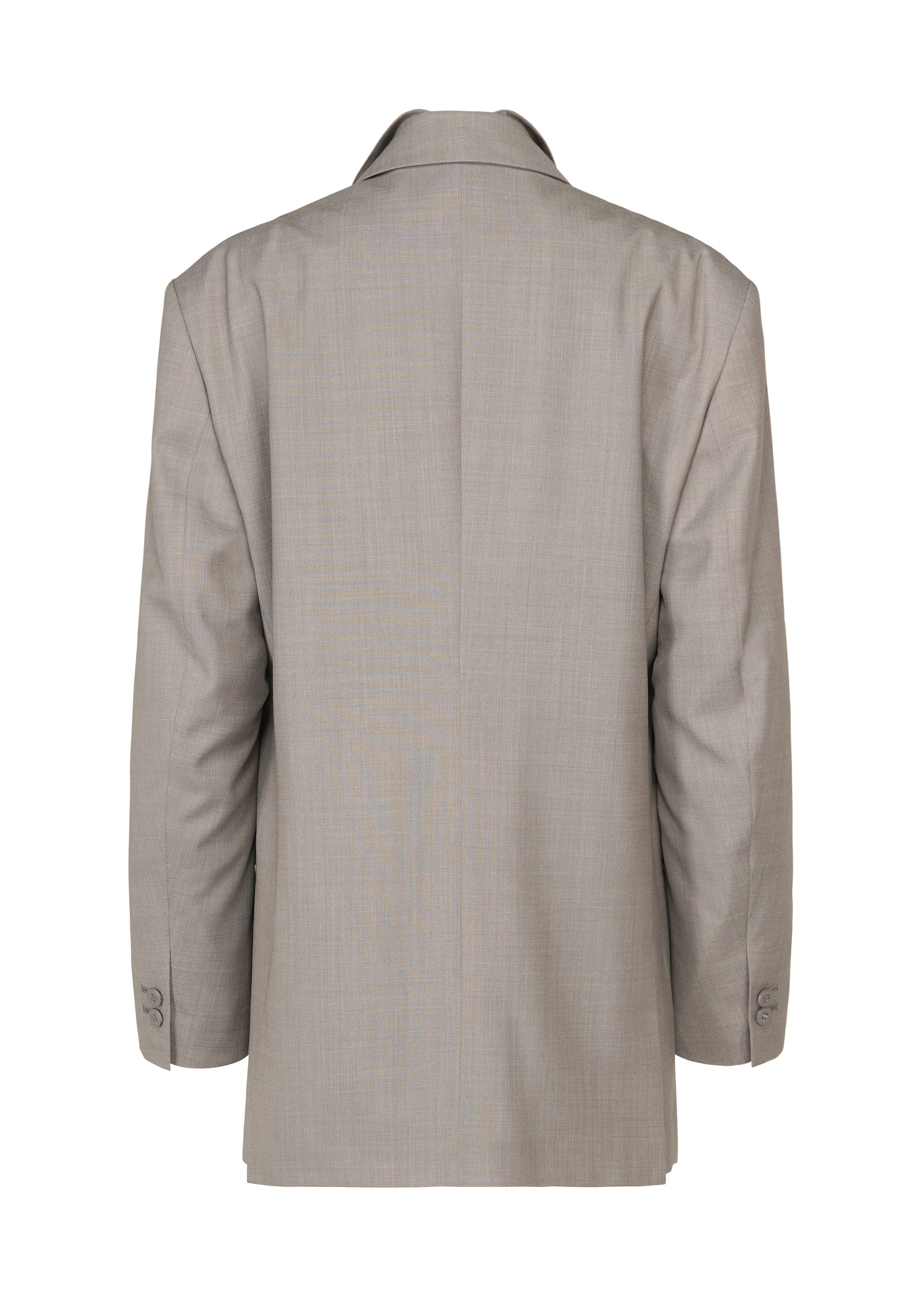 A detail shot of the ISSEY MIYAKE HONEST ENSEMBLE jacket.