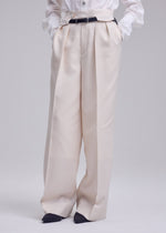 A model wears the ISSEY MIYAKE UNTITLED trousers.