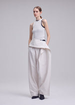 A model wears the ISSEY MIYAKE GRAINY PANTS grainy-trousers-trousers-black-3.