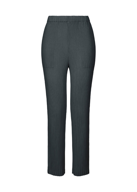 A product shot of the ISSEY MIYAKE HATCHING BOTTOMS pants in dark navy.