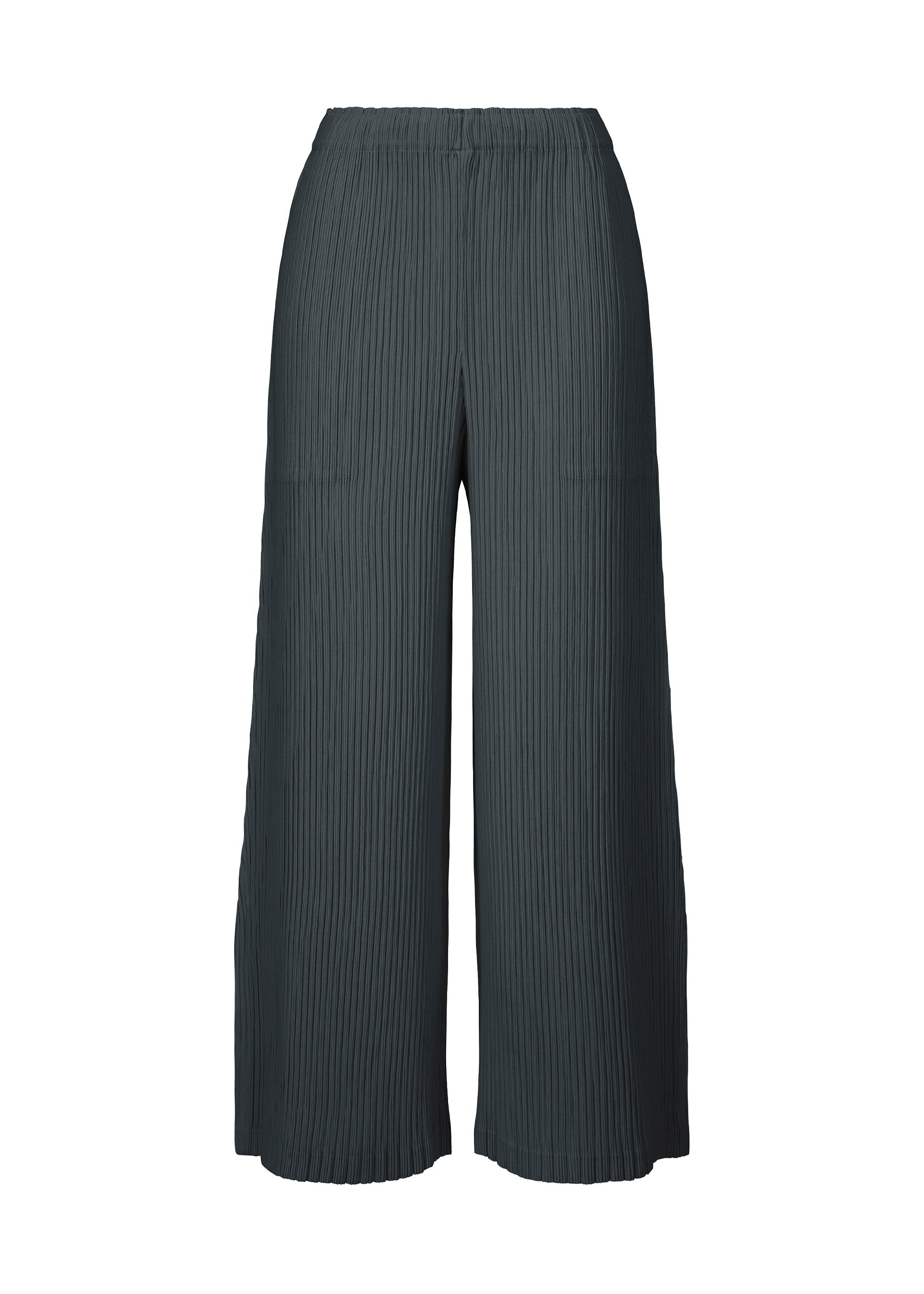 A product shot of the ISSEY MIYAKE HATCHING BOTTOMS pants in dark navy.