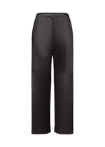 A product shot of the ISSEY MIYAKE GLOSSED PANELS PLEATS trousers in black.