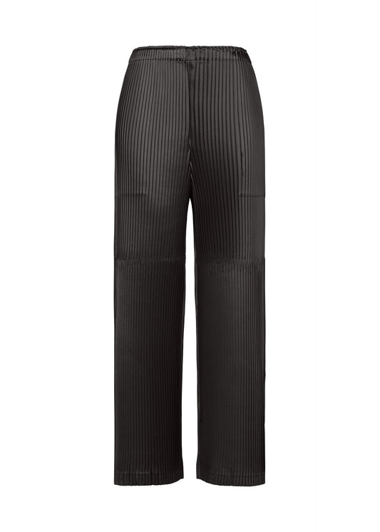 A product shot of the ISSEY MIYAKE GLOSSED PANELS PLEATS trousers in black.