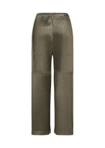 A detail shot of the ISSEY MIYAKE GLOSSED PANELS PLEATS trousers.