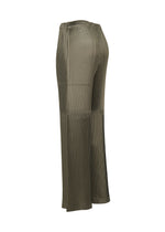 A detail shot of the ISSEY MIYAKE GLOSSED PANELS PLEATS trousers.