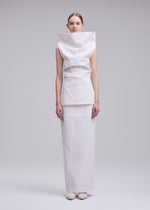 A model wears the ISSEY MIYAKE ALLOW allow-skirt-grey-1.
