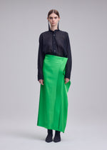 A model wears the ISSEY MIYAKE MERCURY mercury-skirt-dark-navy-1.