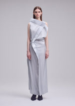 A model wears the ISSEY MIYAKE MERCURY mercury-dress-dark-navy-1.