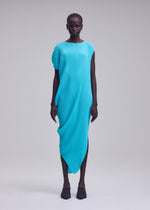 A model wears the ISSEY MIYAKE LEAF PLEATS leaf-pleats-dress-dark-navy.