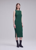 A model wears the ISSEY MIYAKE RHOMBUS PLEATS rhombus-pleats-dress.