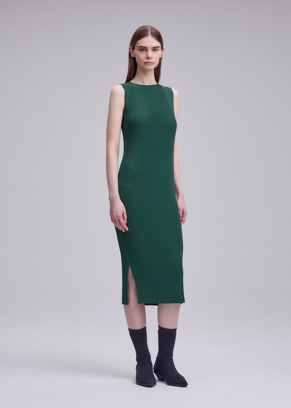 A model wears the ISSEY MIYAKE RHOMBUS PLEATS rhombus-pleats-dress-1.