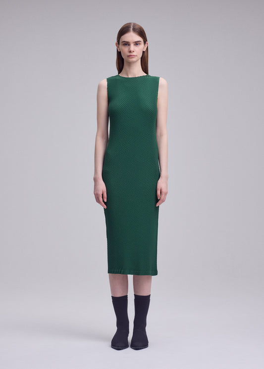 A model wears the ISSEY MIYAKE RHOMBUS PLEATS rhombus-pleats-dress.