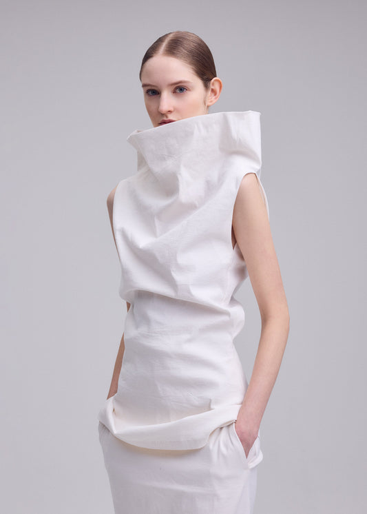A model wears the ISSEY MIYAKE ALLOW allow-shirt-dark-navy-2.