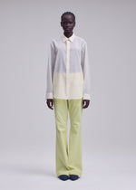 A model wears the ISSEY MIYAKE SHEER WOOL sheer-wool-shirt-dark-navy-2.