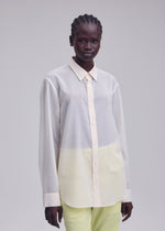 A model wears the ISSEY MIYAKE SHEER WOOL sheer-wool-shirt-dark-navy-2.