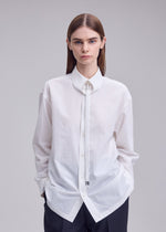A model wears the ISSEY MIYAKE MONSIEUR SHIRT monsieur-shirt-shirt-white-1.