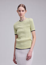 A model wears the ISSEY MIYAKE RILL rill-shirt-dark-navy-3.
