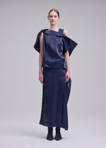 A model wears the ISSEY MIYAKE MERCURY mercury-shirt-dark-navy-1.