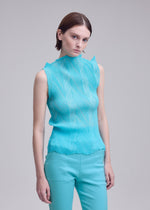 A model wears the ISSEY MIYAKE ZIGZAG PLEATS zigzag-pleats-shirt-black-1.