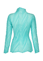 A detail shot of the ISSEY MIYAKE ZIGZAG PLEATS shirt.